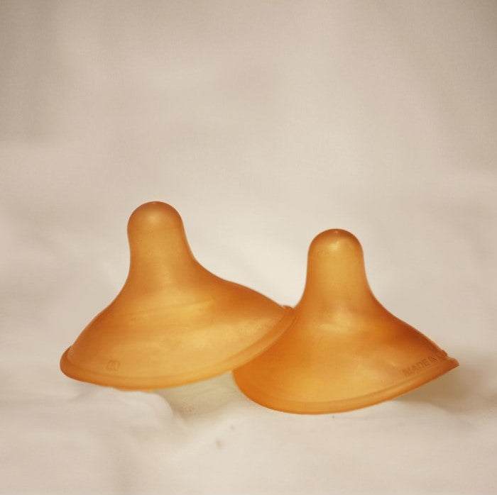 Hevea natural rubber nipple shield for breastfeeding.
