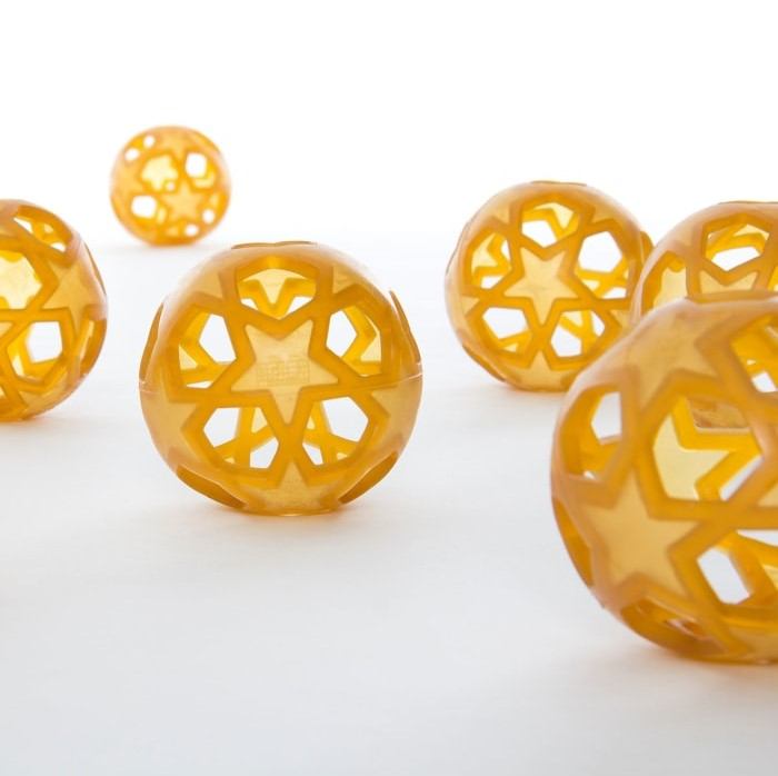 Natural rubber Hevea Star Ball with star patterns, eco-friendly and child-safe design.