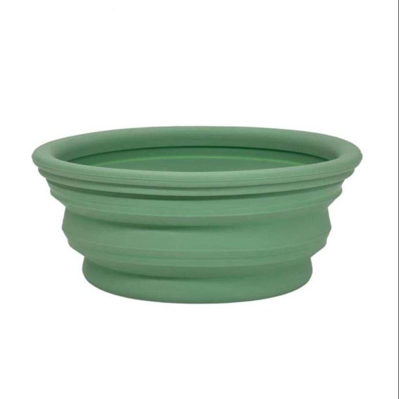 Hevea putna posuda za pse u bledo mentastoj boji, napravljena od prirodne gume, biorazgradiva.