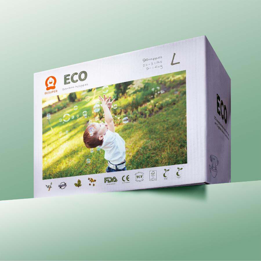 BeSuper ECO Bamboo Pelene-Gaćice packaging on a green background featuring a child playing with bubbles in nature.