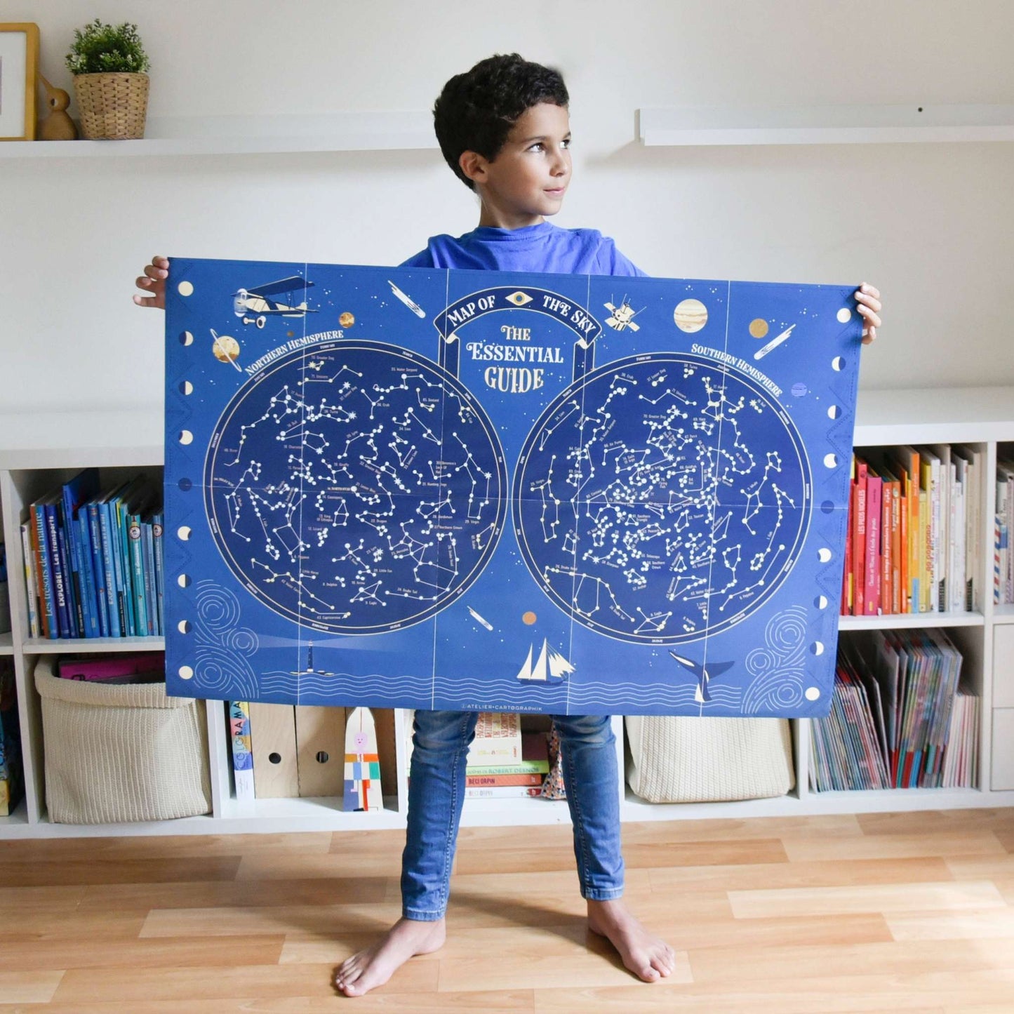 Educational sticker poster of celestial map glowing in the dark for kids aged 6+, includes 640 reusable stickers.
