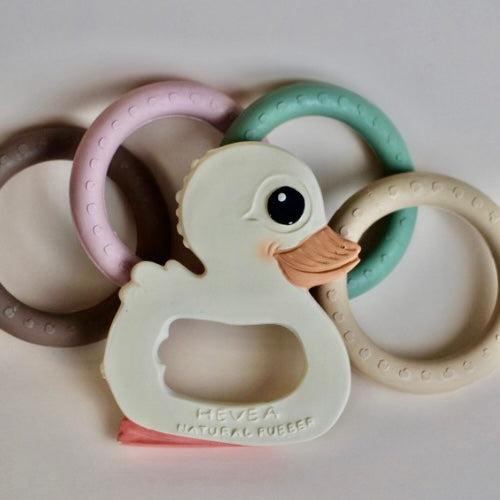 Hevea Kawan soothing gift set with natural rubber teether and colorful rings.
