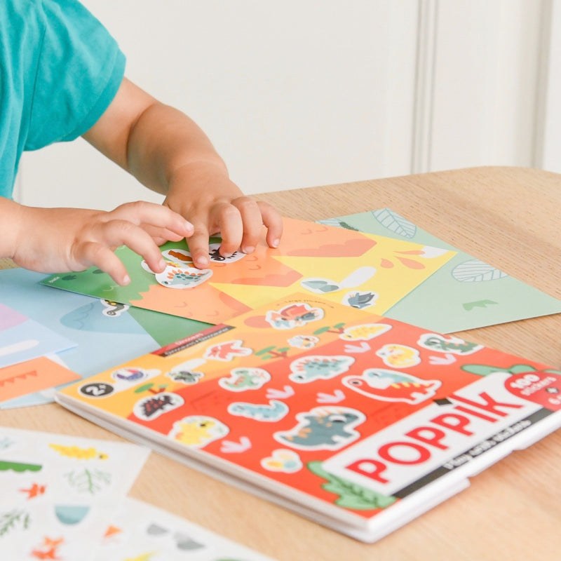 Poppik Moje prve nalepnice set for kids aged 2+, including 96-100 repositionable stickers and activity sheets.