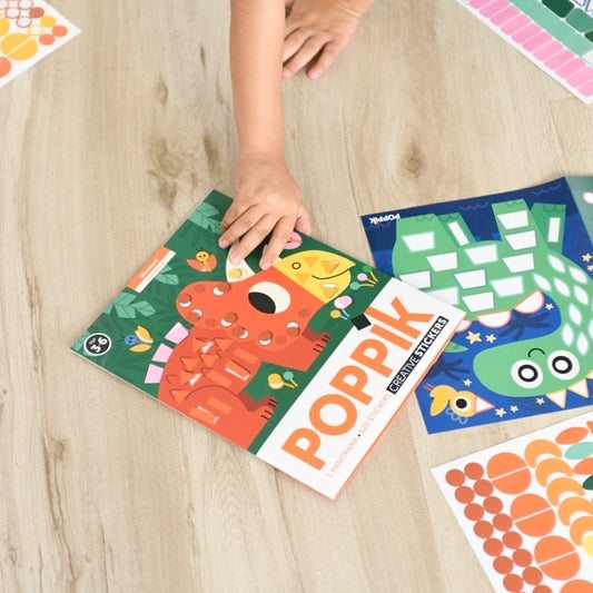 Poppik Panorama dinosaur sticker activity for children, engaging creative play.