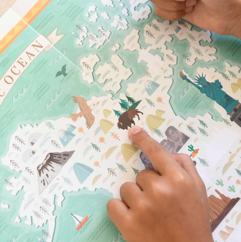 Educational poster with stickers featuring world monuments and landmarks; suitable for ages 7+, design by Viktor Medina.