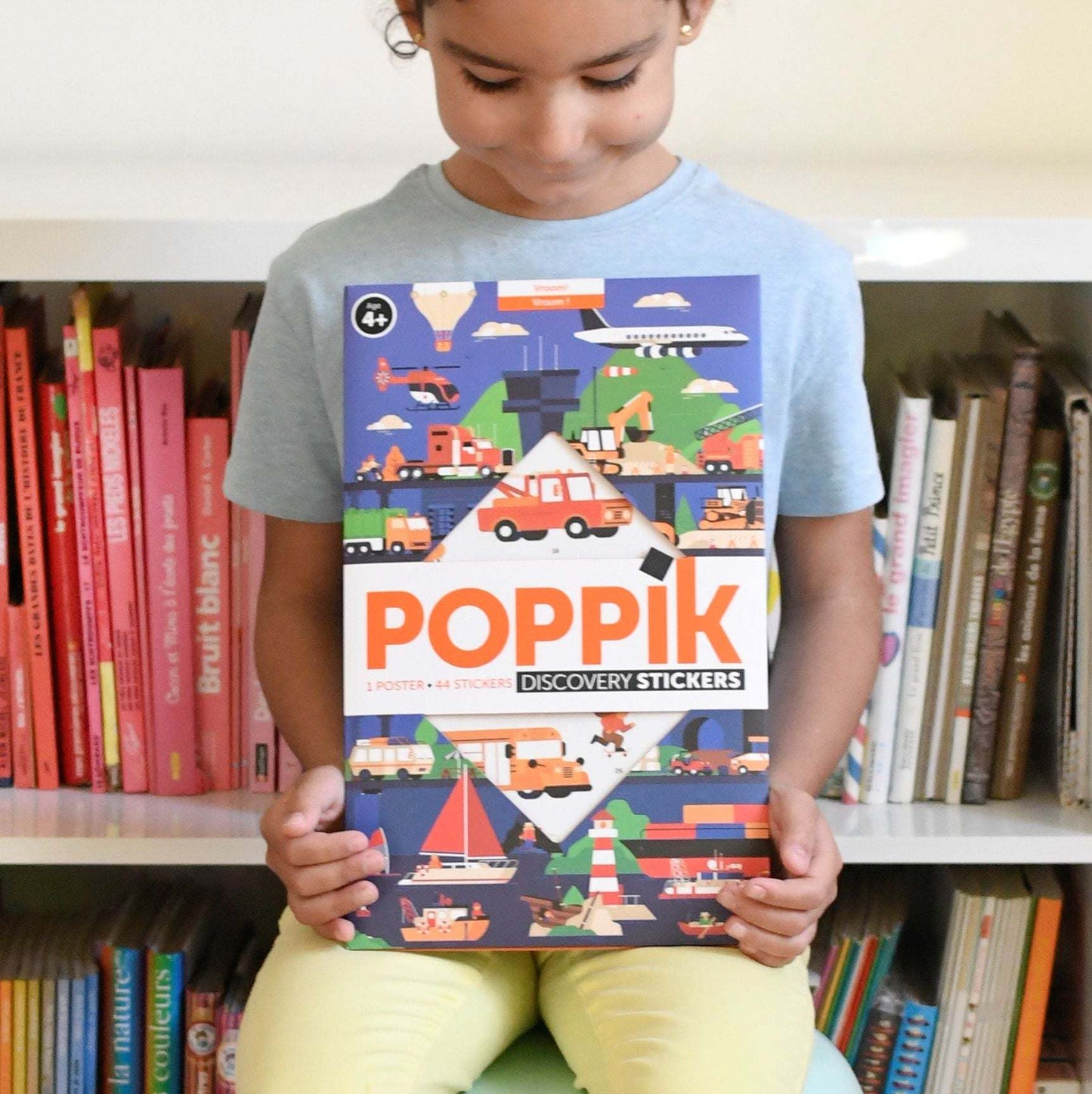 Children's educational poster with stickers of vehicles for learning and fun.