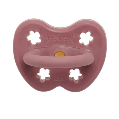 Hevea ortodontska cucla roza za bebe (3-36 meseci) sa cvetnim otvorima.