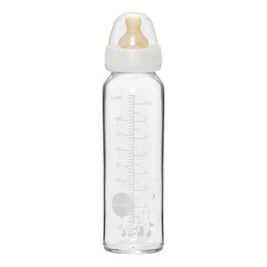 Hevea glass baby bottle with calibrated measurements and rubber nipple.